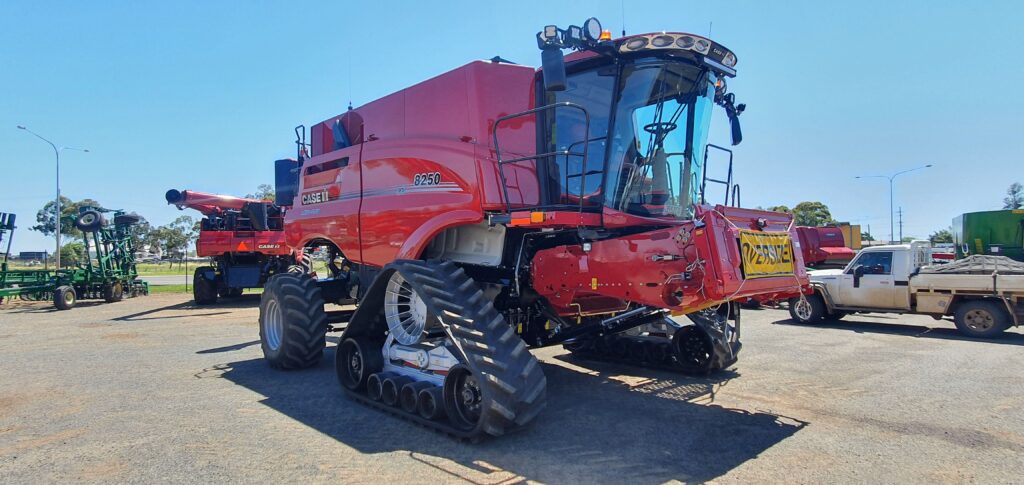 CASE IH 8250 combine harvester wearing CAMSO bolt ons